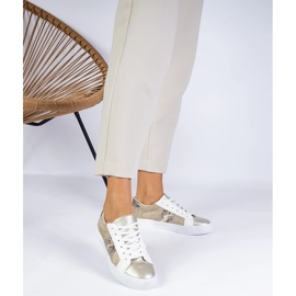 Golden sneakers with an animal motif decorated with glitter 1