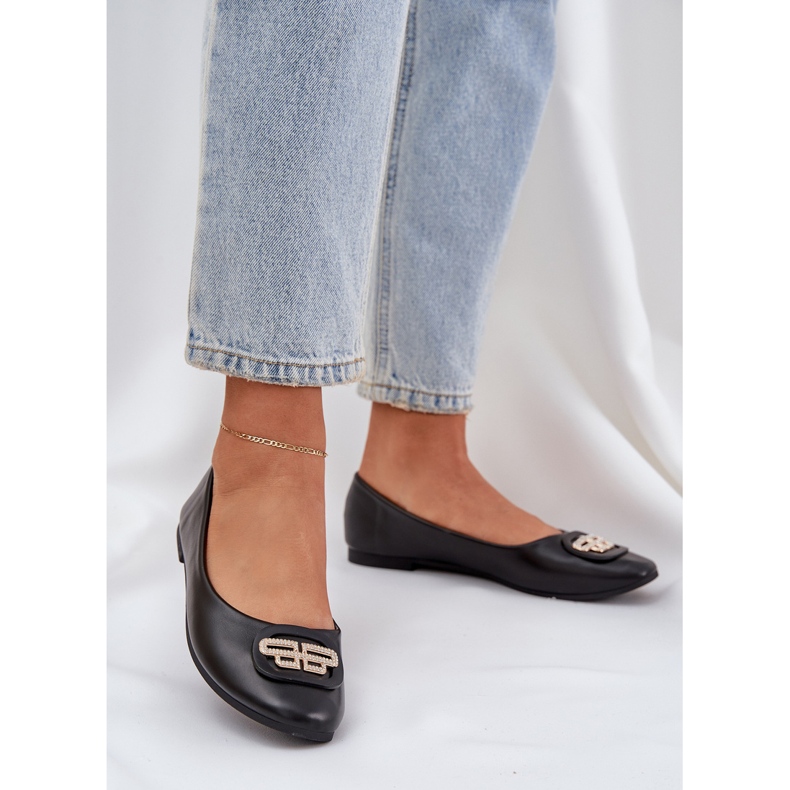 Ballerinas on a flat sole with a black decoration 2 Ballerinas on a flat sole with a black decoration 2