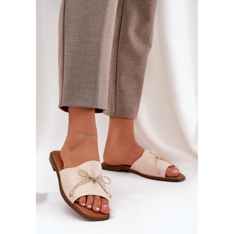 Flat soles with a decorative beige bow 2 Flat soles with a decorative beige bow 2
