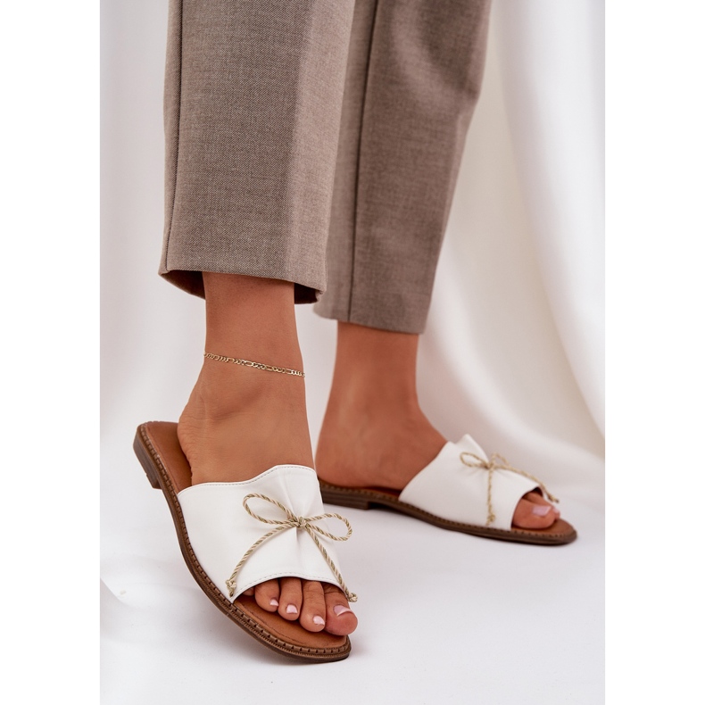 Flat sole flip flops with a decorative bow white 2