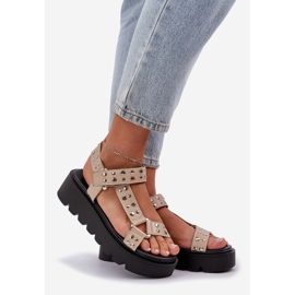 Decorated sandals on the beige platform 1