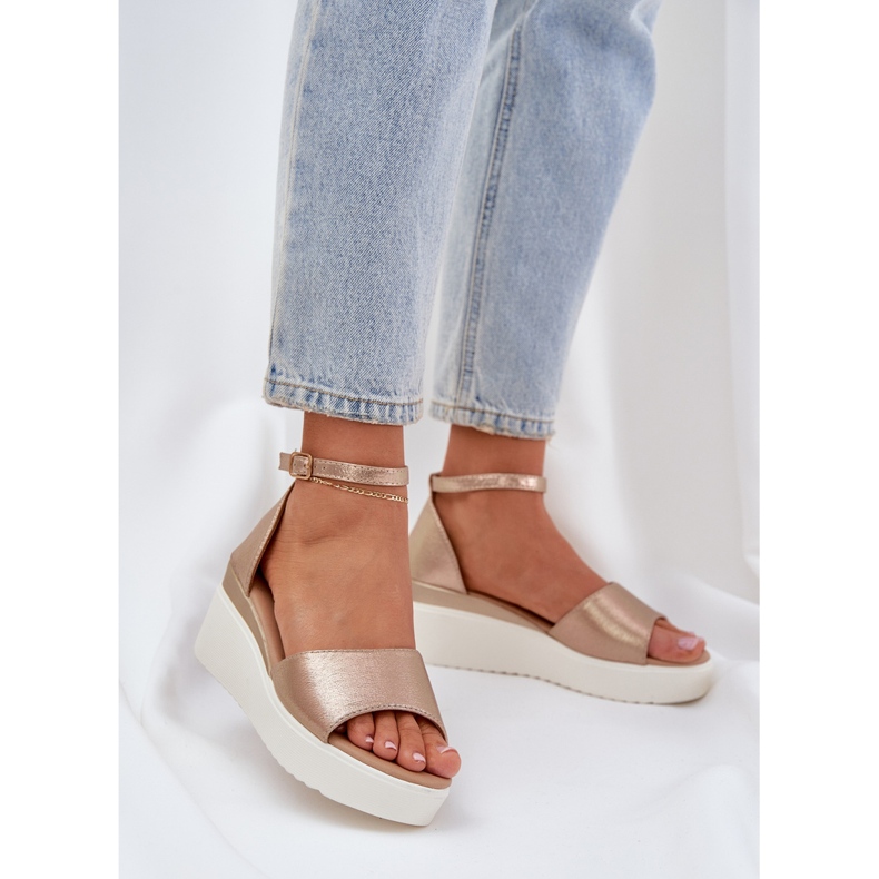 Light sandals on the platform and delicate gold wedges golden 2
