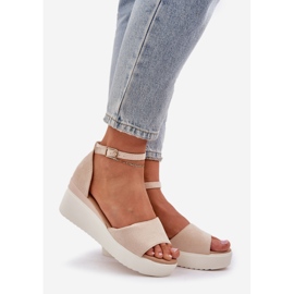 Light sandals on the platform and delicate bright beige wedges 1