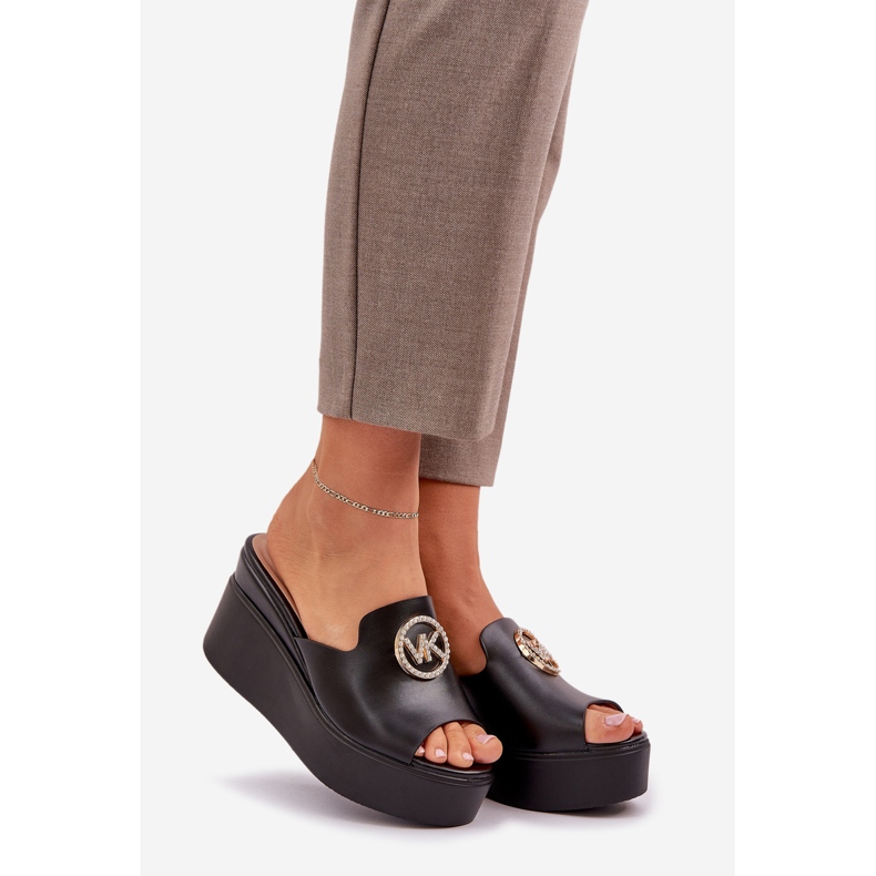 Slippers on the platform and wedges with a black decoration 1