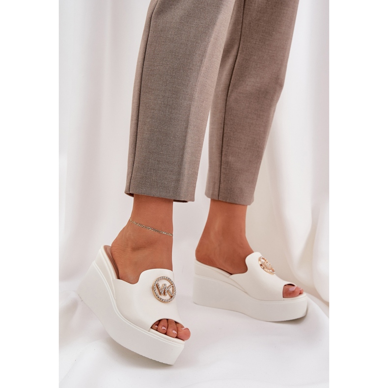 Slippers on the platform and wedges with a white ornament 2