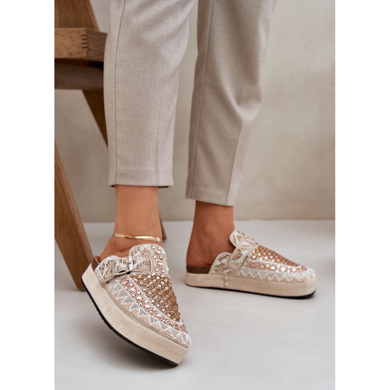 Decorated flip flops on the beige platform 2