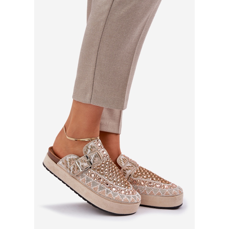 Decorated flip flops on the beige platform 1