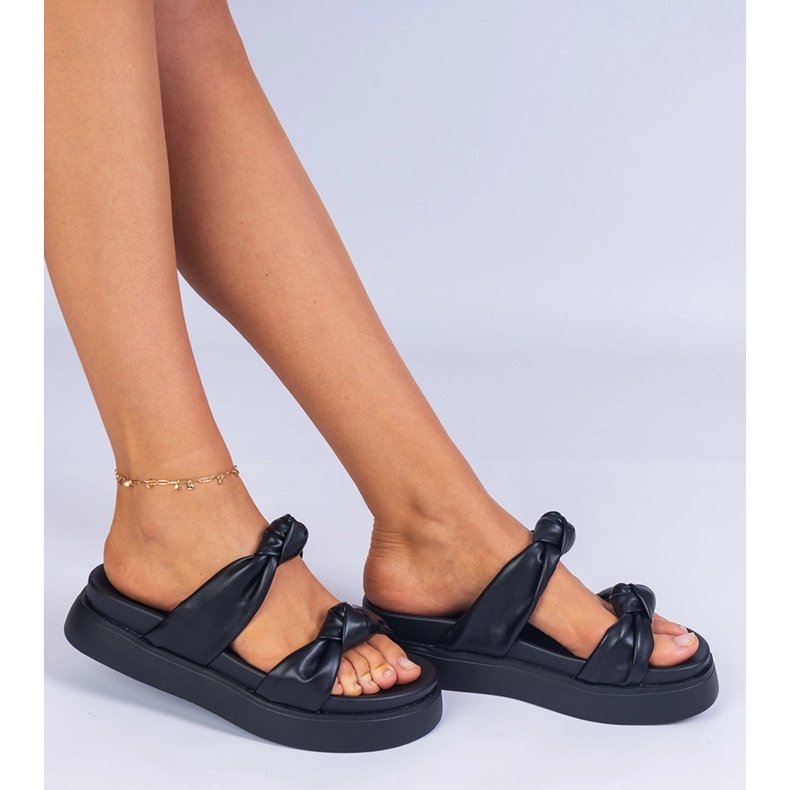 Black slippers on the platform 1 Black slippers on the platform 1