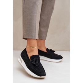 Moccasins on a delicate Eco wedge black 2 Moccasins on a delicate Eco wedge black 2