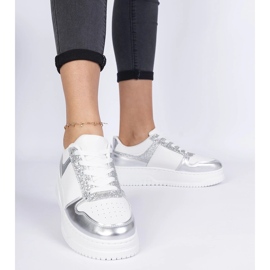 Silver women's sneakers on a thick sole 1
