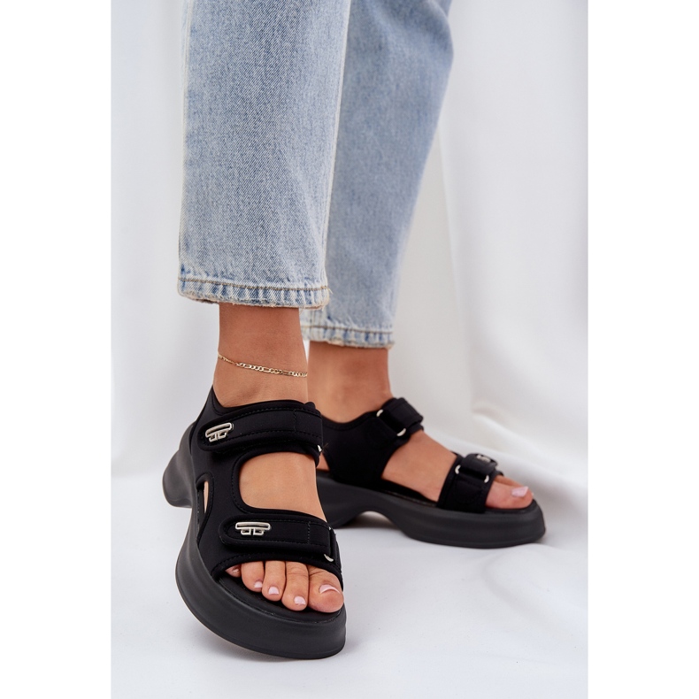 Material light sandals on the black platform 2