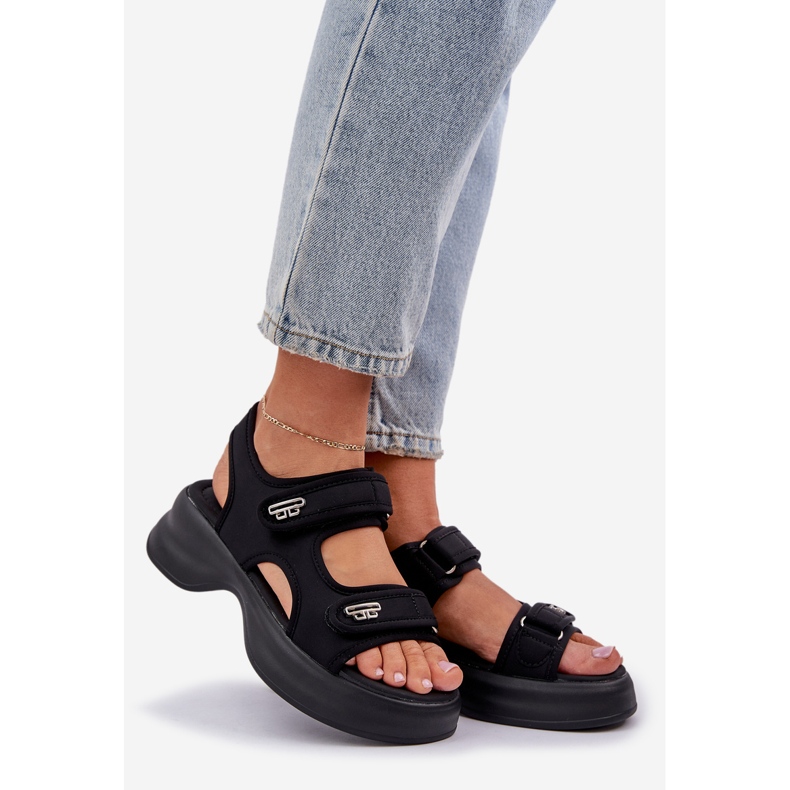 Material light sandals on the black platform 1