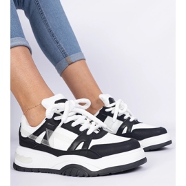 Black and white sneakers with thick laces 2