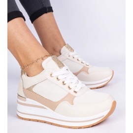 Beige sneakers decorated with glitter and a metal insertion 2