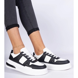 Black and white women's sneakers with a thick sole 2
