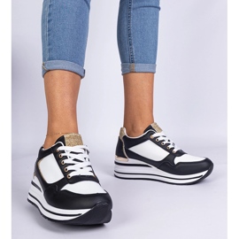 Black sneakers decorated with glitter and a metal insert 1