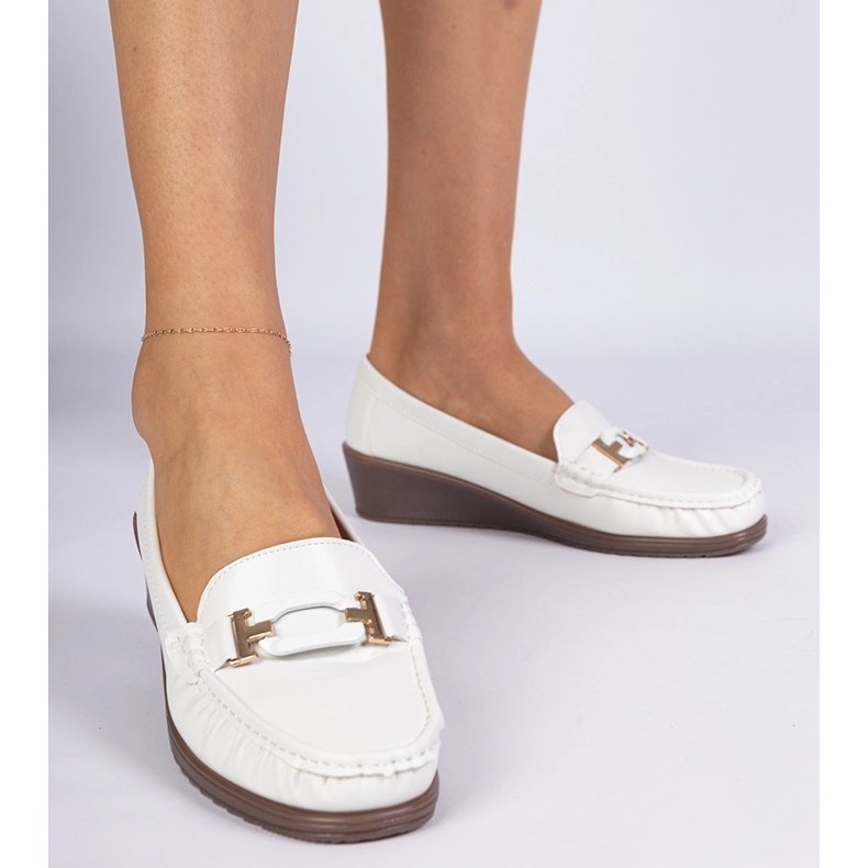 White women's moccasins on ancody of eco -leather 1 White women's moccasins on ancody of eco -leather 1