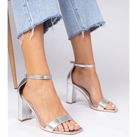 Silver sandals on a high post 1