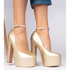 Gold metallic pumps on a high post golden 2 Gold metallic pumps on a high post golden 2