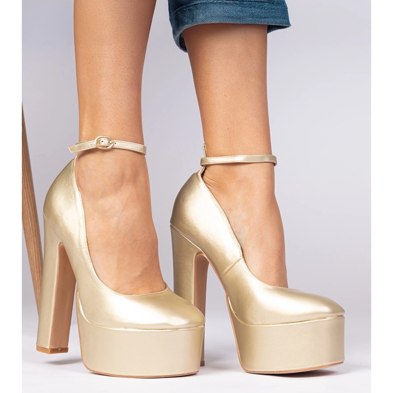 Gold metallic pumps on a high post golden 2 Gold metallic pumps on a high post golden 2