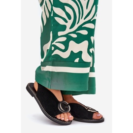 Flat sandals with black decoration 1