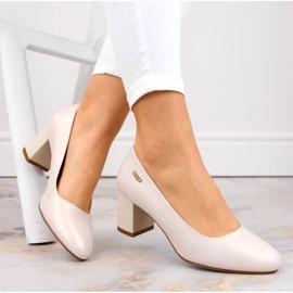 Pearl beige pumps on a decorative post from Sergio Leone 1