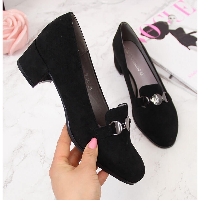 Women's black shoes with a block by Sergio Leone 2