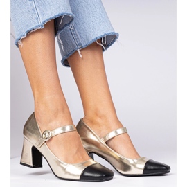 Golden women's pumps with a black nose 2 Golden women's pumps with a black nose 2