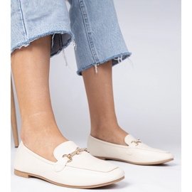 Beige elegant loafers with a golden decoration and zircons 1