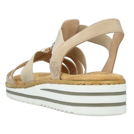 Comfortable women's slip-on sandals with elastic bands, beige Rieker V0649-62 1