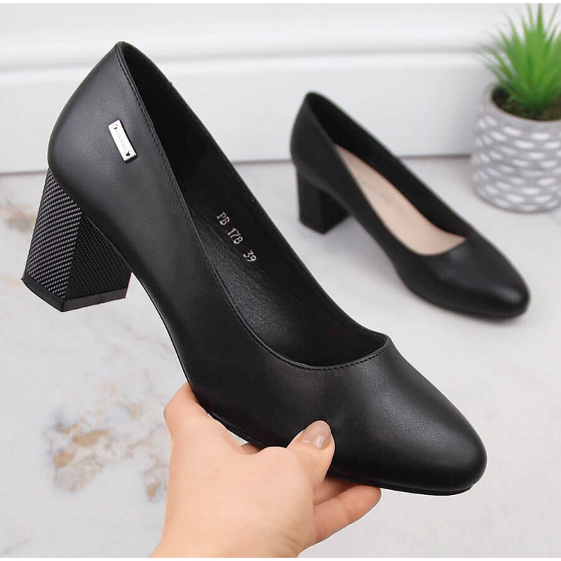 Black pumps on a decorative post from Sergio Leone 1