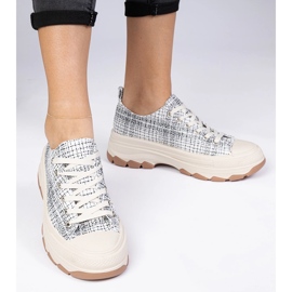 Black and white sneakers on a thick sole 2 Black and white sneakers on a thick sole 2