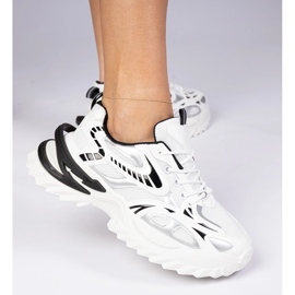 White sports sneakers with a massive sole 1