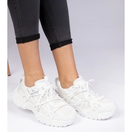 White sneakers stylish on a massive sole 1