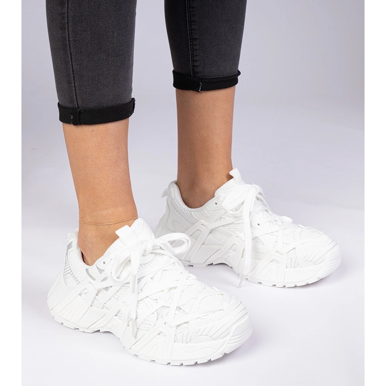 White sneakers on a massive sole 1 White sneakers on a massive sole 1