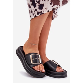 Women's slippers on a massive platform with a decorative black buckle 1