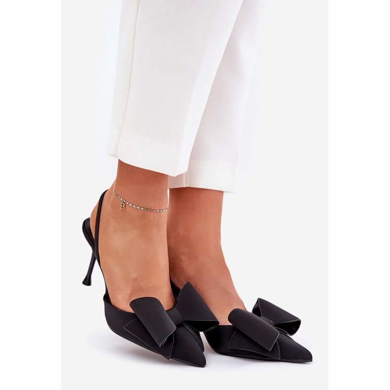 High heels with bare heels and a black bow 1 High heels with bare heels and a black bow 1