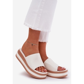 Classic women's slippers on the platform and white wedges 1