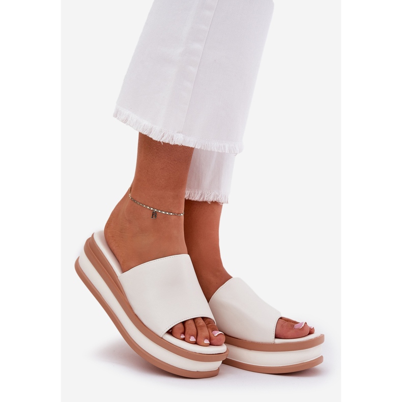Classic women's slippers on the platform and white wedges 1
