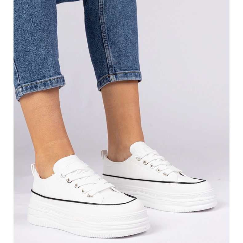 White women's sneakers on a high sole 1