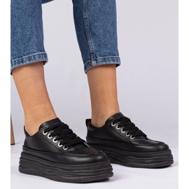 Black women's sneakers on a high sole 1