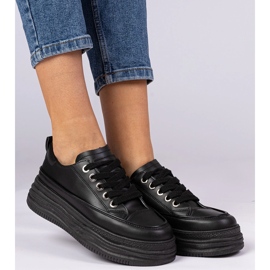 Black women's sneakers on a high sole 2