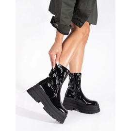Patent leather black ankle boots on a high platform 1
