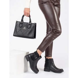 Black women's ankle boots with a buckle on a low heel 2