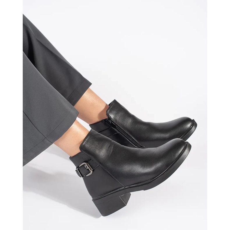 Black women's low-heeled ankle boots with a decorative buckle 1