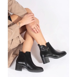 Black women's ankle boots with a decorative zipper and buckle 2 Black women's ankle boots with a decorative zipper and buckle 2