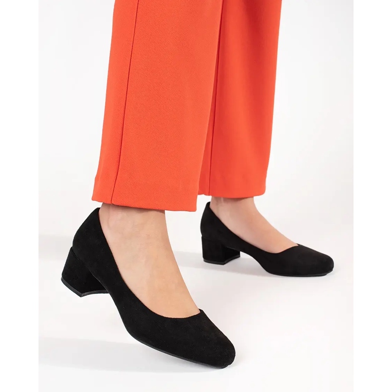 Black suede pumps on the Sergio Leone post 1 Black suede pumps on the Sergio Leone post 1