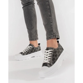 Black sneakers on the platform with decorations 1