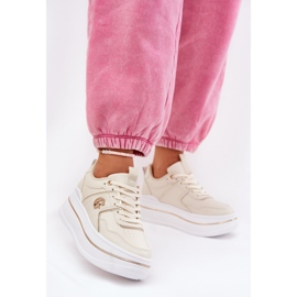 Women's sports shoes on the platform beige 2