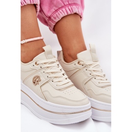 Women's sports shoes on the platform beige 7